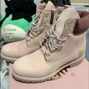 Light pink timberlands, never used and have been sitting in box for a long time.